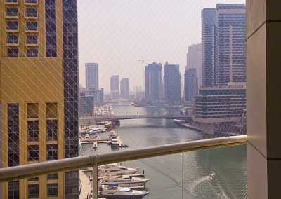 Safety netting barrier along large balcony - Dubai Marina.