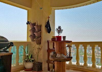 balcony-secret-secured-against-pigeons-netting-Ras-Al-Khaimah