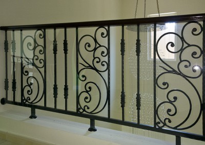 Polycarbonate safety shield on gallery railings in Jumeirah Islands.